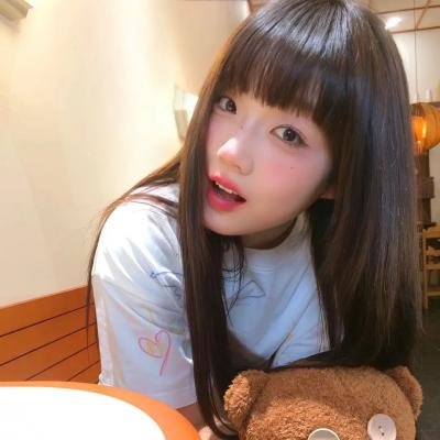 照片的她